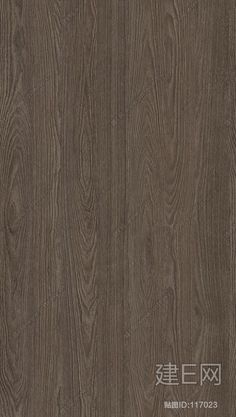 the wood grained surface is dark brown and has been used as a background or wallpaper