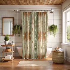 a bathroom with a shower curtain and rug