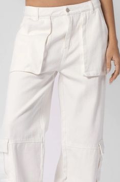 Final Sale - Get it before it's gone! Step out in style in the Jess White Low Rise Denim Cargo Pants! Woven off-white fabric forms these cute low-rise cargo pants with front cargo pockets. Six-pocket construction, banded waist with belt loops, and front pockets. Pair with a cropped tee and your buckle sandals for a fun look. DETAILS & FIT Low-Waisted Fit. Cotton. Machine wash cold. Imported. Mid-rise Beige Cotton Cargo Jeans, White Wide Leg Cargo Jeans With Multiple Pockets, White Wide-leg Cargo Jeans With Multiple Pockets, White Utility Cargo Jeans With Pockets, Summer Straight Cargo Jeans With Pockets, White Cotton Pants With Cargo Pockets, Spring White Cargo Pants With Multiple Pockets, Spring Cotton Cargo Jeans With Pockets, White Cotton Pants With Multiple Pockets