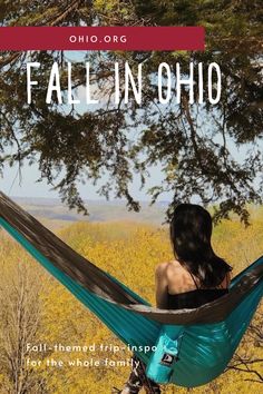 a woman sitting in a hammock with the words fall into ohio on it