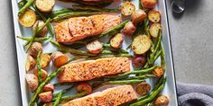 salmon, potatoes and green beans on a white platter