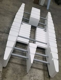 several pieces of white plastic sitting on top of each other