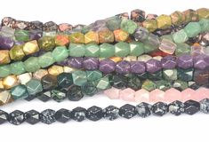 there are many different colored beads together