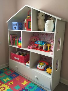 a child's toy shelf with toys on it