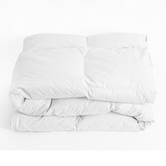 an unmade bed with white sheets and pillows on top of it, against a white background