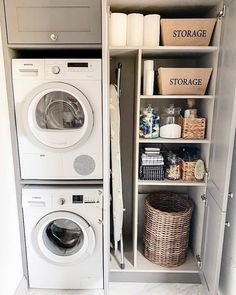 a washer and dryer sitting inside of a closet next to eachother