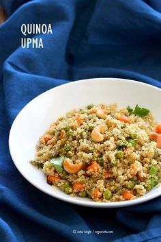 a white bowl filled with rice and vegetables