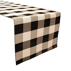 a black and white checkered table runner