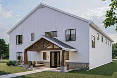 a large white house with a covered porch