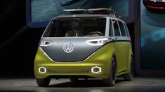 the volkswagen concept vehicle is on display at an auto show