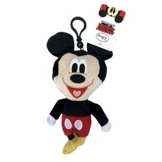 a mickey mouse keychain with a tag on it's head and ears