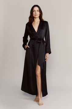 The Matador robe has an elegant elongated silhouette that drapes effortlessly. Made with 19mm silk satin and accented with tonal piping. Use the detachable belt to cinch the waist. Slip it on over the matching pajamas. 100% Silk Satin Cold water wash / hang dry Slim fitting Shawl collar Self-belted wrap closure with button and internal self-tie Long sleeve with vented cuff Model is 175cm / 5'9" and is wearing a Small Elegant Fitted Long Sleeve Sleepwear, Chic Satin Evening Sleepwear, Chic Fitted Silk Sleepwear, Elegant Long Sleeve Evening Sleepwear, Chic Satin Sleepwear For Evening, Fitted Silk Robe For Loungewear, Silk Fitted Robe For Loungewear, Fitted Long Evening Robe, Elegant Fitted Wrap Robe