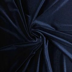 a close up shot of a dark blue fabric