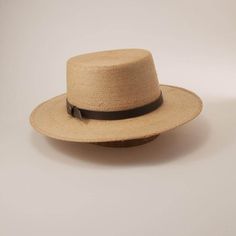 Description The Wide Brim Straw Sun Hat - Cozumel for Men & Women is inspired by hats worn by gondoliers in Venice. The Cozumel Sun Hat has a stiff flat crown and brim with a genuine leather hatband. The lightweight construction and tightly woven pattern make it an excellent accessory for a morning on the water. Wide Brim Straw Sun Hat - Cozumel for Men & Women works just as well afternoon at a social gathering, or an evening... drinking a cold one with your pals. Brim 3" Crown 4" Featherweight Kentucky Derby Natural Color Flat Brim Panama Hat, Kentucky Derby Natural Flat Brim Panama Hat, Kentucky Derby Natural Panama Hat With Flat Brim, Classic Natural Sun Hat With Flat Brim, Beach Panama Hat With Flat Crown Country Style, Classic Wide Brim Top Hat For The Beach, Country Style Panama Hat With Flat Crown For Beach, Country Style Flat Crown Panama Hat For The Beach, Country Style Flat Crown Panama Hat For Beach