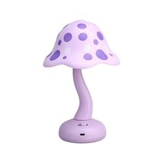 a purple lamp with polka dots on it