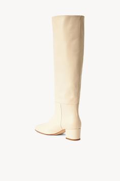 Leather Boot Fits True To Size Upper: 100% Goat Leather (Capra Hircus) Sole: 75% Cow Leather (Bos Taurus) 25% Abs Heel Height: 50Mm Shaft Height: 16" Shaft Height: 18" Calf Opening: 16" Ivory Leather Boots, Putdit With Cream Boots, Cream High Knee Boots, Boot Fits, Heel Accessories, Mule Sandals, Goat Leather, Leather Boot, Flat Boots