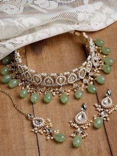 Kundan Choker Set/Indian Jewelry/Bridal Jewelry Handmade Green Glass Beaded Kundan Choker Set/Jewelry Set/Festive Necklace Set Kundanjewelry Gold Plated Light Green Tumble Choker Necklace Set. It is made with high-quality Kundan Stones which makes them very skin-friendly. Perfect for Weddings, Parties, Festivals, and Traditional Occasions. Gracefully pair Saree, Kurti, or any Indo-western outfit to enhance your look. These are made from toxic-free materials which are Anti-Allergic and Safe for t Studded Choker, Kundan Choker Set, Choker Jewellery, Festival Necklace, Gold Jewelry Simple Necklace, Kundan Choker, Silver Choker Necklace, Indian Jewelry Sets, Gold Jewelry Simple