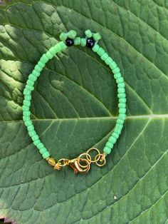 Very adorable frog bracelet. Made with lots of love Frog Clay Bead Bracelet, Novelty Green Beaded Bracelets, Frog Beaded Bracelet, Beaded Lizard Bracelet, Frog Bead Necklace, Favorite Jewelry, Jewelry Bracelets, Bracelet, Beaded Bracelets