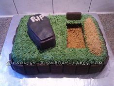 a birthday cake made to look like a baseball field with a bat and glove on top