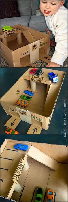 a child is playing with some cardboard boxes