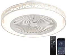 a white ceiling fan with remote control next to an appliance on a white background