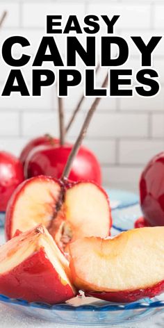 an apple cut in half on a plate with the words easy candy apples above it