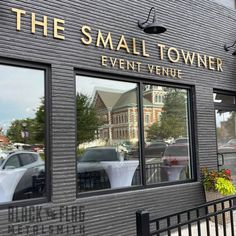 the small towner event venue is reflected in the windows