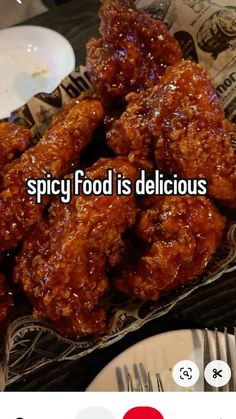 some food is sitting on a plate with the words spicy food is delicious written across it