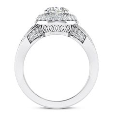 a white gold engagement ring with an oval center stone surrounded by small round brilliant cut diamonds