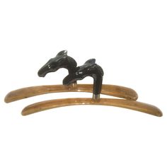 two black horse head on wooden hair clips