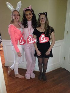 three girls in bunny costumes posing for the camera