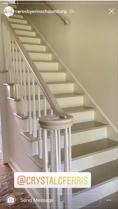 the stairs are painted white and there is a message on the bottom right hand side