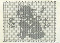 a cross stitch pattern with an image of a cat on it's back side