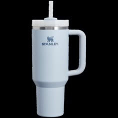 a white travel mug with a straw sticking out of the cup and stanley logo on it