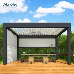 an outdoor patio with a table and bench under a pergolated roof, surrounded by flowers