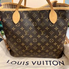 Authentic Louis Vuitton Neverfull Used A Handful Of Times Couple Of Watermarks Minimal Marks Inside Smoke Free Home Date Code Sd3177 Includes Dust Bag And Box Please Examine All Pictures As This The Purse You Will Be Receiving Bags Louis Vuitton, Louis Vuitton Neverfull Mm, Neverfull Mm, Vuitton Neverfull, Louis Vuitton Bags, Louis Vuitton Bag Neverfull, Authentic Louis Vuitton, Louis Vuitton Neverfull, Louis Vuitton Bag