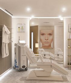 a dental room with all white furniture and lights on the ceiling, in front of a large mirror