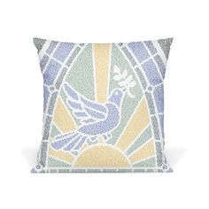 a pillow with a bird on it and the sun in the background is made out of blue