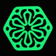 a black background with a green hexagonal design