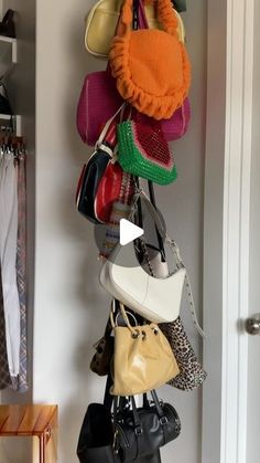 AARICA NICHOLE on Instagram: "wanted to see how my bags would look color coordinated ❤️🧡💛💚🩵

#organization #organizationideas #purses #diy" Bag Hanger Ideas, Diy Purse Rack, Bag Storage Ideas, Tidy Tips, Hand Bag Storage Ideas, Diy Purse Organizer, Messy Home