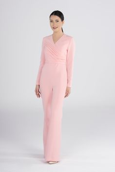 Elevate your style with our Elegant Pink Flare Pants Jumpsuit. This chic and trendy one-piece, designed for a stylish statement, brings together elegance and comfort. Whether it's a special occasion or a night out, this jumpsuit offers a unique blend of fashion-forward design and sophistication. Key Features: Elegant pink color and flare pants design Perfect for special occasions and stylish gatherings Comfortable and trendy women's fashion Unique statement piece for a fashionable look Make a lasting impression with this chic jumpsuit. Order now to add a touch of elegance and style to your wardrobe. Elegant V-neck Cocktail Jumpsuits And Rompers, Elegant Long Sleeve Jumpsuits And Rompers For Evening, Chic V-neck Pantsuit For Party, Elegant Fitted V-neck Jumpsuits And Rompers, Chic V-neck Suits For Spring, Formal Full-length Jumpsuits And Rompers For Spring, Full Length Formal Jumpsuits And Rompers For Spring, Elegant Long Sleeve Jumpsuits For Cocktail, Elegant Long Sleeve Jumpsuits For Cocktail Events