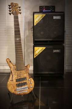 an electric guitar and amp are on display