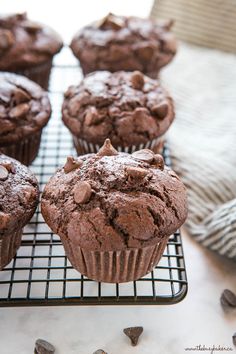 chocolate muffins cooling on a wire rack