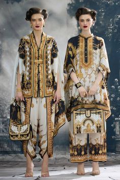 Black and gold silk tunic with all over regal prints. - Aza Fashions Elegant Festival Sets With Digital Print, Gold Silk Kurta For Ceremonial Occasions, Elegant Silk Kurta With Digital Print, Gold Kaftan For Ceremonial Festivals, Luxury Gold Silk Set, Elegant Gold Designer Kaftan, Bohemian Gold Sets For Eid, Silk Kaftan With Digital Print Tunic, Luxury Silk Bohemian Tunic