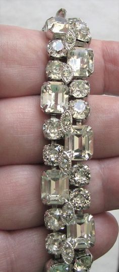 "Vintage Eisenberg Ice rhinestone Bracelet. This is in excellent, clean, undamaged condition. No missing,bad, dull or yellowed rhinestones. No noticeable wear or damage to rhodium plated silver tone frame. Features 2 rows of dentelle (round, premium rut) and octogon rhinestones. Measures 7 1/16\" x 5/8\"." Dazzling Crystal Tennis Bracelet With 17 Jewels, Dazzling Rhinestone Bracelets For Formal Occasions, Formal Crystal Rhinestone Costume Bracelet, Rhinestone Costume, Beautiful Glassware, Grandmother Jewelry, Vintage Jewelry Repurposed, Vintage Jewelry Antique, Antique Costume Jewelry