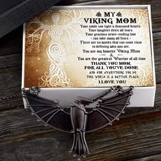 What is the best gift idea for your Mom for her Birthday, Christmas, Thanksgiving, Graduation, Mother's day etc? Why not surprise her with a unique yet charming Dark Raven Necklace? This necklace features a dark raven pendant which is an iconic and magical creature in the Viking world, specially designed for Viking lover. It will be with her side by side, wherever she goes so she can feel that you are always there for her. The necklace also comes with a lovely handmade gift box and a heartfelt m Black Jewelry With Gift Box For Giving, Black Jewelry With Gift Box For Occasions, Black Jewelry With Gift Box For Gift, Black Jewelry With Gift Box, Themed Black Jewelry As Gift, Themed Black Jewelry Gift, Mother's Day Jewelry With Gift Packaging, Novelty Necklaces For Valentine's Day Gift, Mother's Day Gift Necklace With Message Card