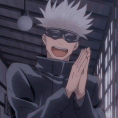 an anime character with white hair and black eyes is smiling while holding his hands together