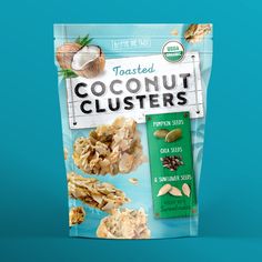 a bag of toasted coconut clusters with nuts and seeds in it on a blue background