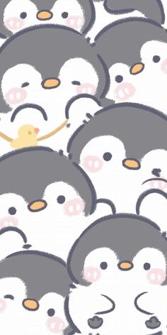 a bunch of penguins that are standing together