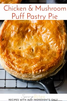 two chicken and mushroom pies sitting on top of a cooling rack with text overlay that reads chicken and mushroom pie all ingredients from aid